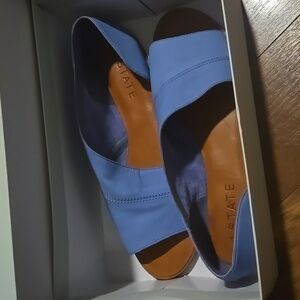 Brand new asymmetrical slip on sandal